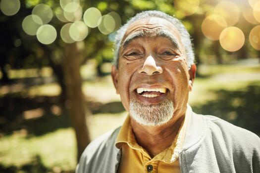 The Smile Legacy: TapLook, RideSenior, and TapSenior Are Building and Preserving Beautiful Moments of Happiness for Seniors 13 senior man portrait and bokeh in nature garden or park with freedom confidence and wellness in retirement happy face and elderly smile with pride in backyard environment or holiday in summer photo